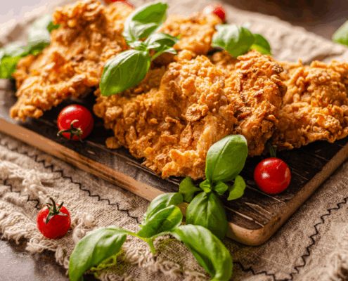 Mit Cornflakes panierte Schnitzel